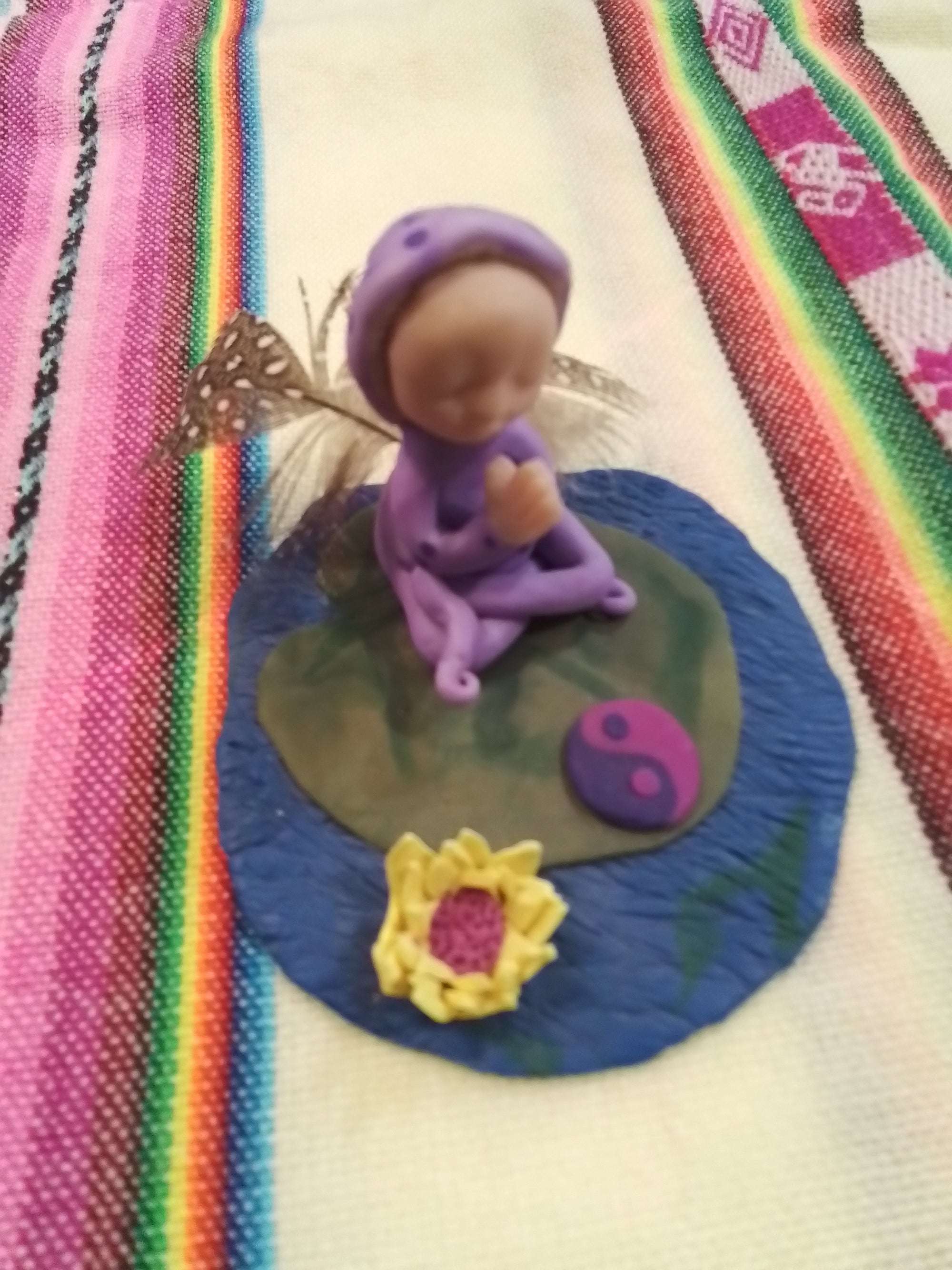 Clay being-Purple Fairy sitting on leaf in Pond with Yimg and Yang and lotus