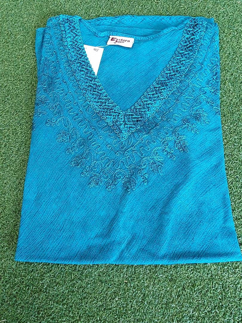 Top, Sleeveless "V" Neck top